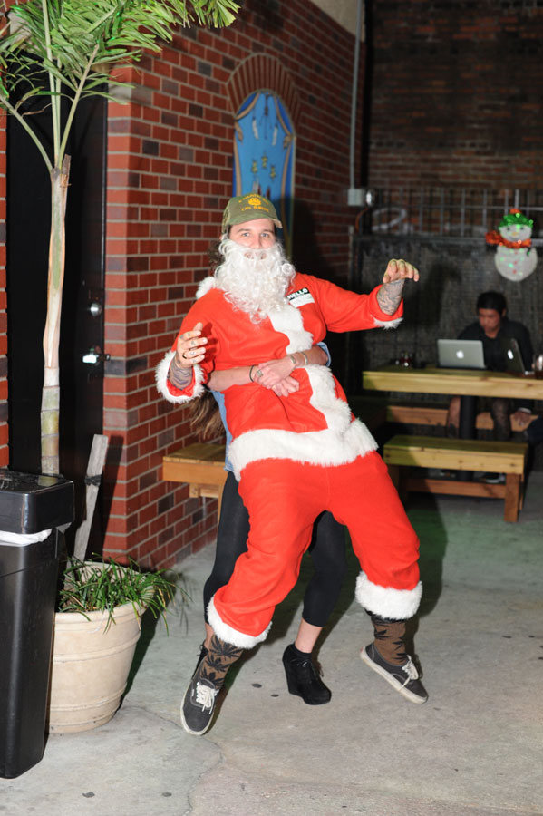 You gotta be strong to be picking up drunk Santa